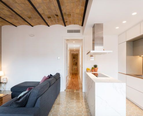 Kitchen with Neolith island in a renovation in the Eixample of Barcelona